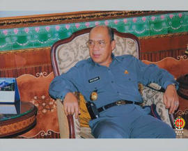 Tampak Wakil Gubernur Sumatra Selatan Mahyuddin NS sedang duduk.