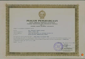 Piagam penghargaan dari BP-7 DIY diberikan kepada Drs. Suharyanto Sismadi, M. Sc. Ed, dkk sebanya...