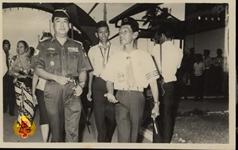 Menteri Dalam Negeri Mayor Jenderal Basuki Rachmat berjalan bersama Kepala Desa beserta rombongan...