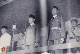 Presiden RI, Ir. Soekarno didampingi Panglima Besar Jenderal Soedirman & Muhamad Hatta sedang...